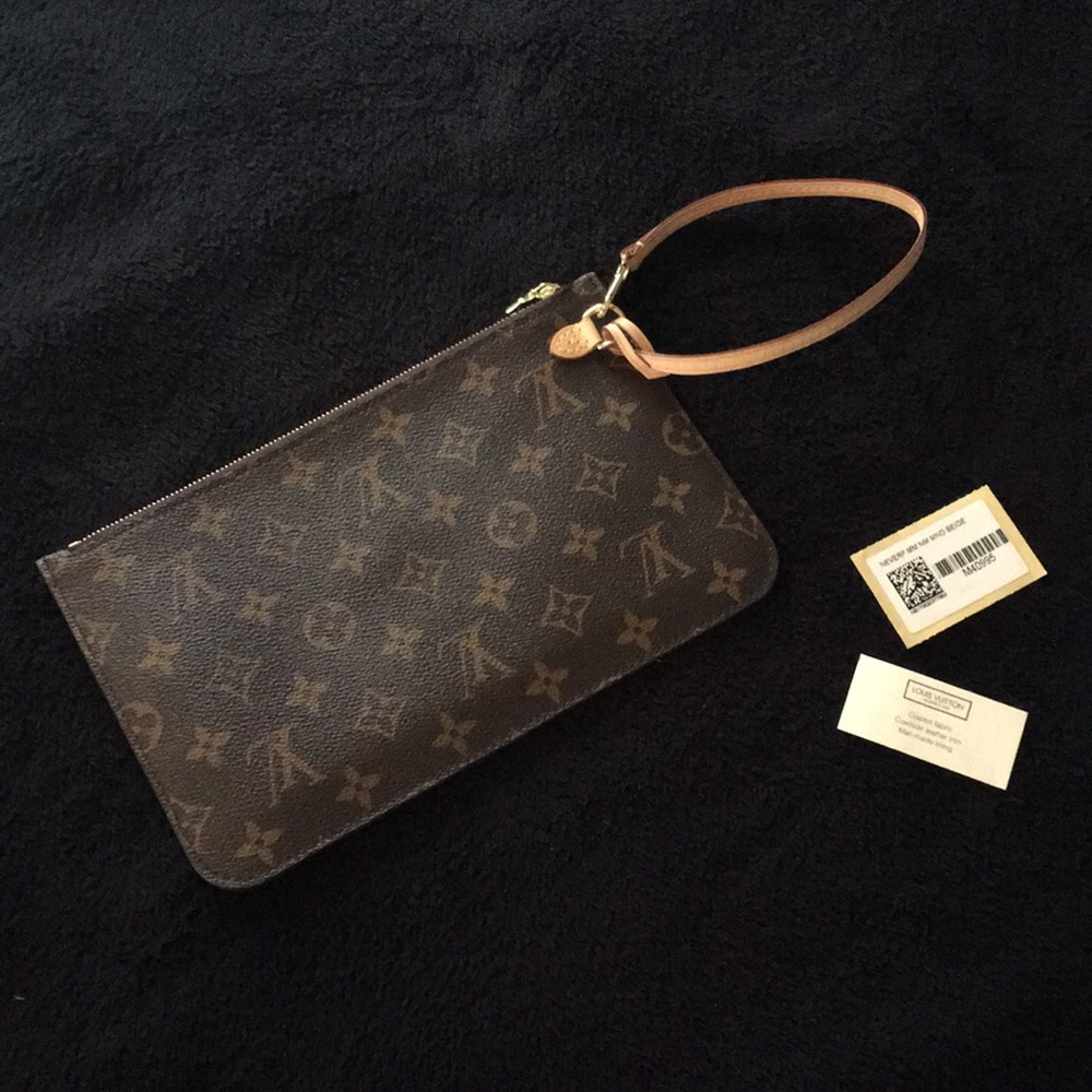 Louis Vuitton Neverfull MM zippered clutch